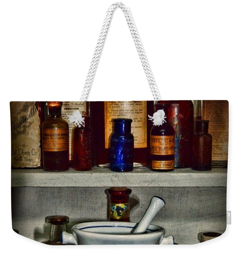 Paul Ward Weekender Tote Bag featuring the photograph Pharmacy - Stocked Shelves by Paul Ward