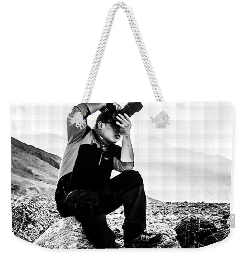  Weekender Tote Bag featuring the photograph Phototravels by Aleck Cartwright