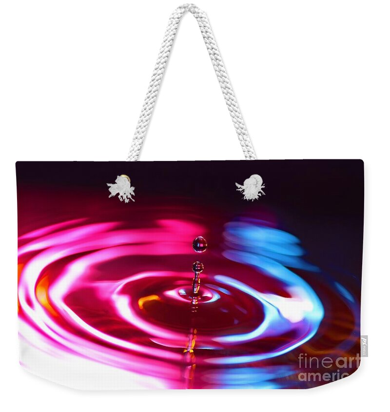 Water Weekender Tote Bag featuring the photograph Physics of Water 1 by Jimmy Ostgard