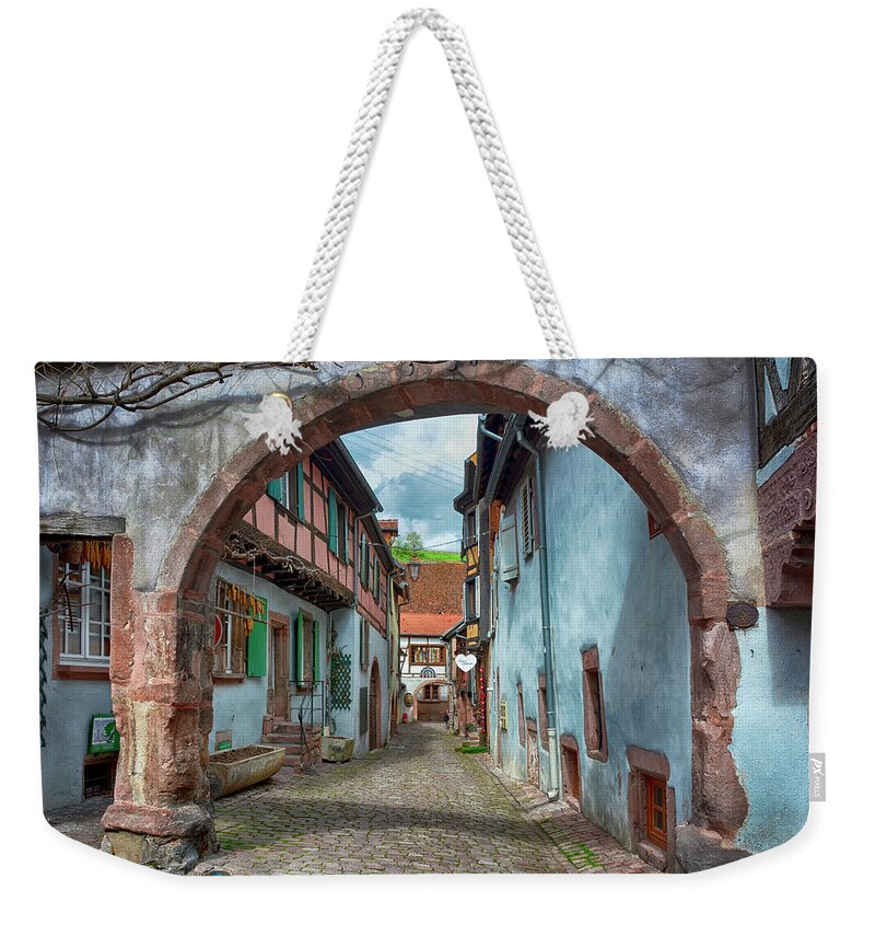 Alley Weekender Tote Bag featuring the photograph picturesque Alsation Riquewihr by Joachim G Pinkawa