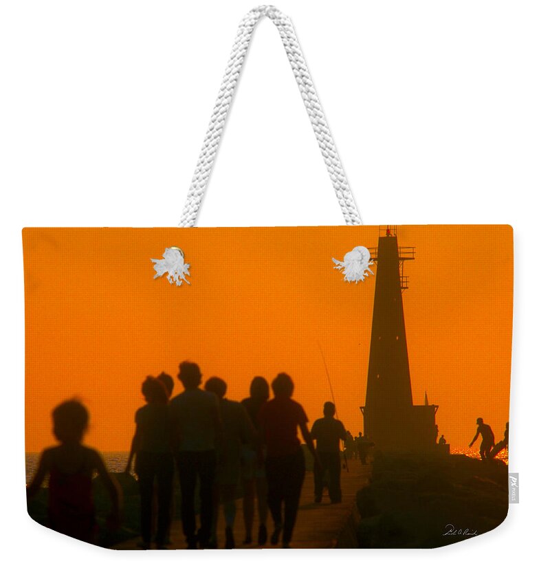 Photography Weekender Tote Bag featuring the photograph Pier Walkers by Frederic A Reinecke