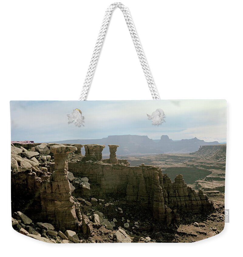 Pillars Weekender Tote Bag featuring the photograph Pillars Canyonlands by Peter J Sucy