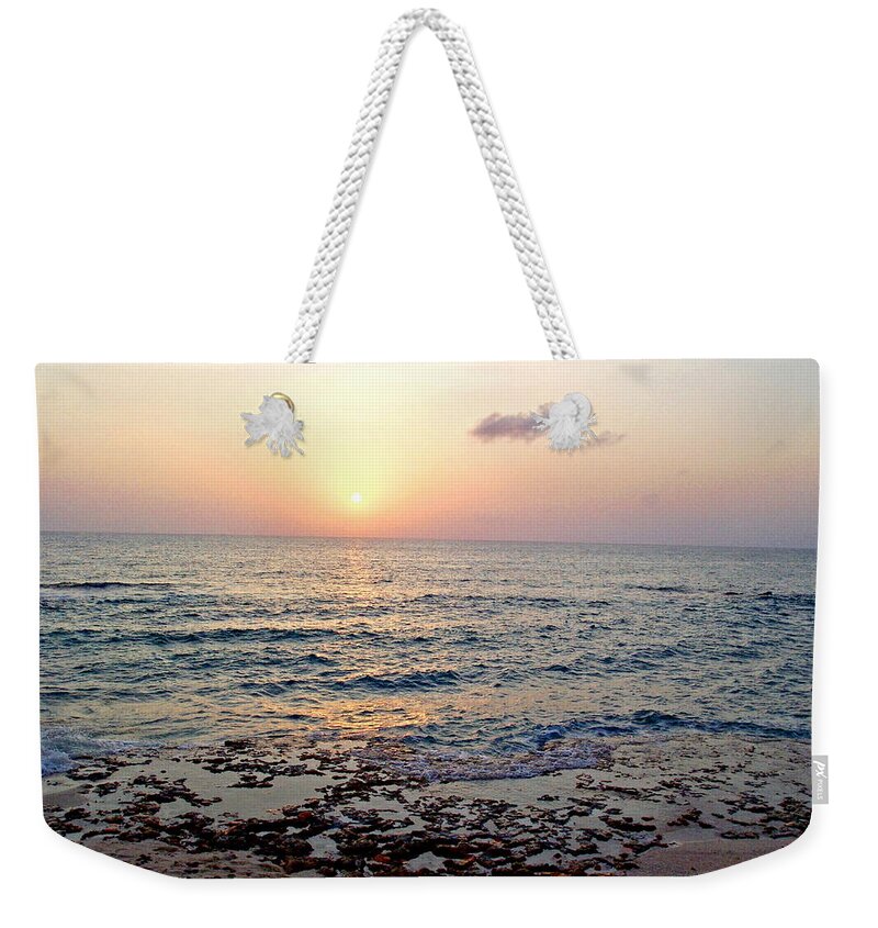 Nature Weekender Tote Bag featuring the photograph Pink and Purple Sunset over Grand Cayman by Amy McDaniel