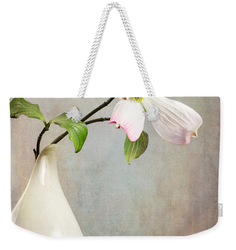 Cornus Weekender Tote Bag featuring the photograph Pink Cornus Kousa Blossom in Creamer by Betty Denise