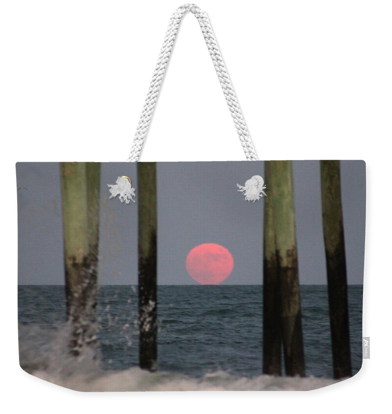 Moon Weekender Tote Bag featuring the photograph Pink Moon Rising by Robert Banach