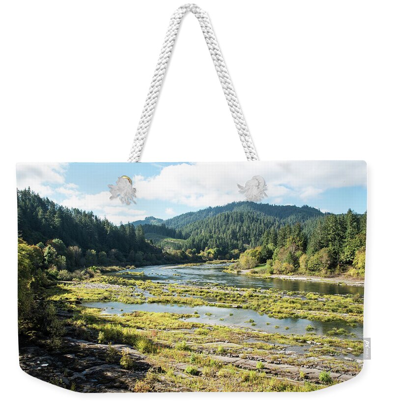 Placid Umpqua River In October Weekender Tote Bag featuring the photograph Placid Umpqua River in October by Tom Cochran