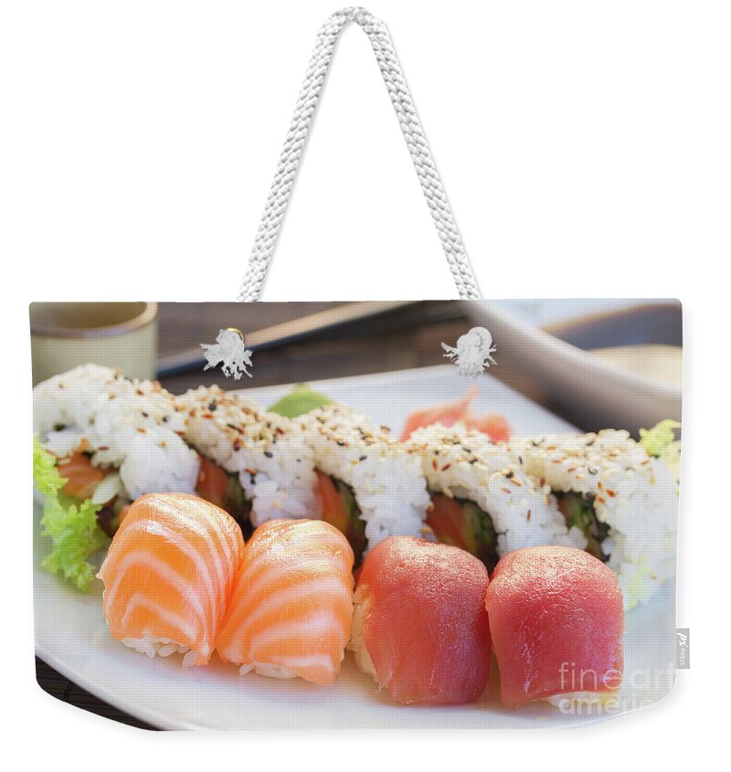 Sushi Weekender Tote Bag featuring the photograph Plate with Sushi by Anastasy Yarmolovich