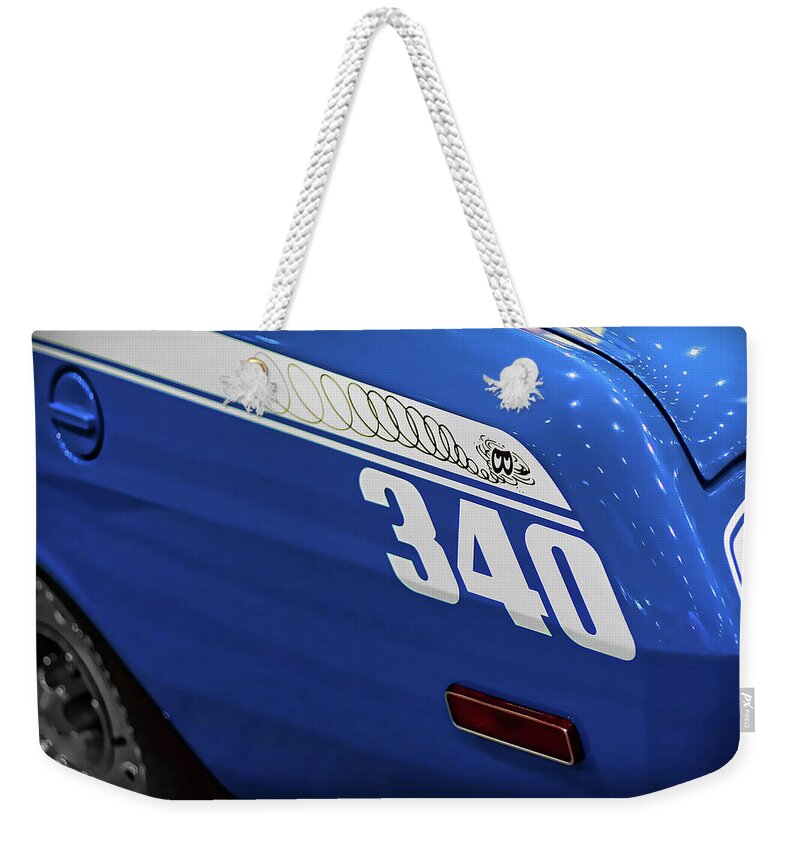 1970 Weekender Tote Bag featuring the photograph Plymouth Duster 340 by Gordon Dean II