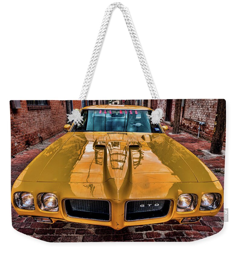 Pontiac Weekender Tote Bag featuring the photograph Pontiac GTO - The Judge by Adam Reinhart