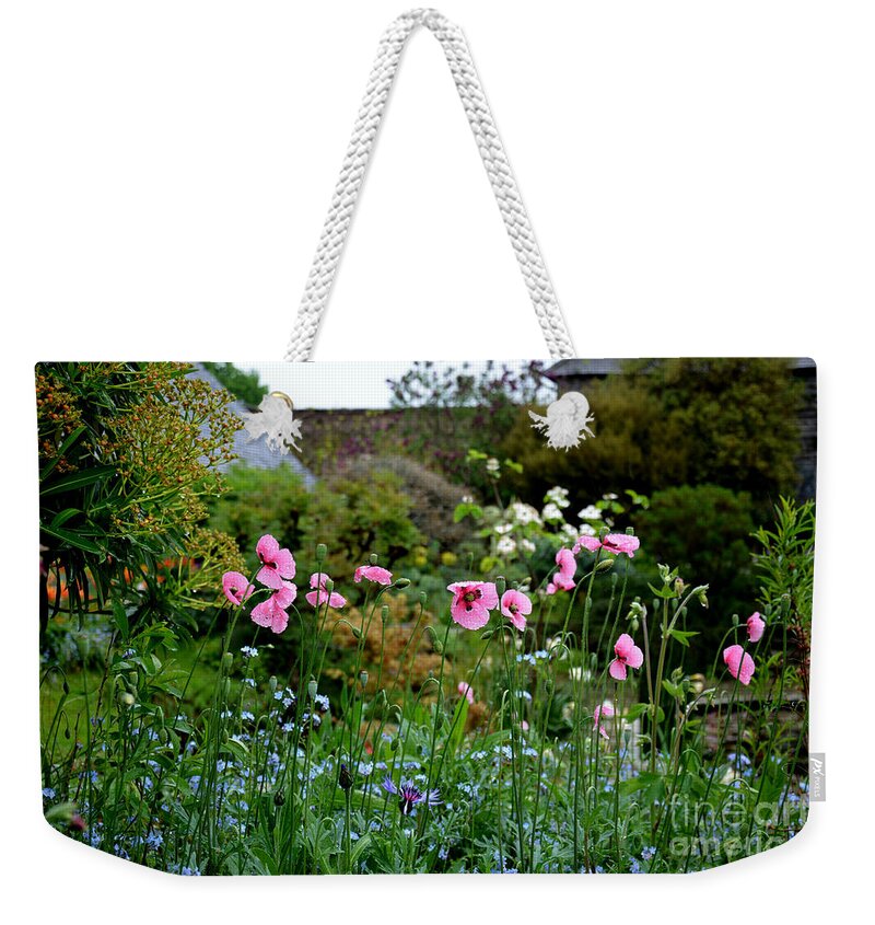 Flowers Weekender Tote Bag featuring the photograph Poppies of the Great Dixter by Tatyana Searcy