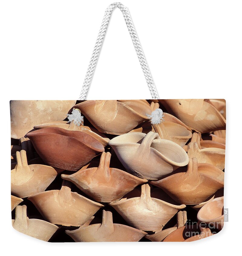 Pottery Weekender Tote Bag featuring the photograph Pottery Display by Marc Nader