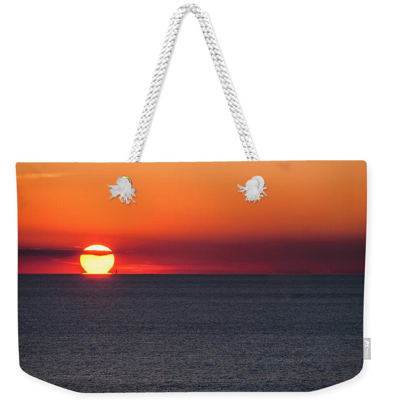 Sunset Weekender Tote Bag featuring the photograph Pour Some Sunset by Charles McCleanon