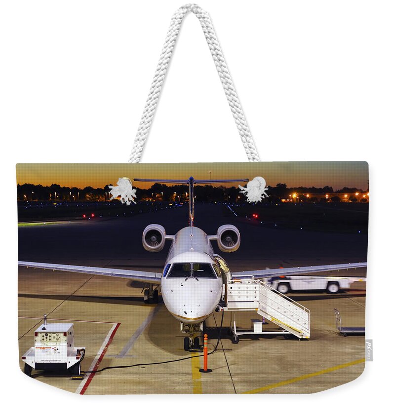 Embraer Weekender Tote Bag featuring the photograph Preparing for Departure by Jason Politte