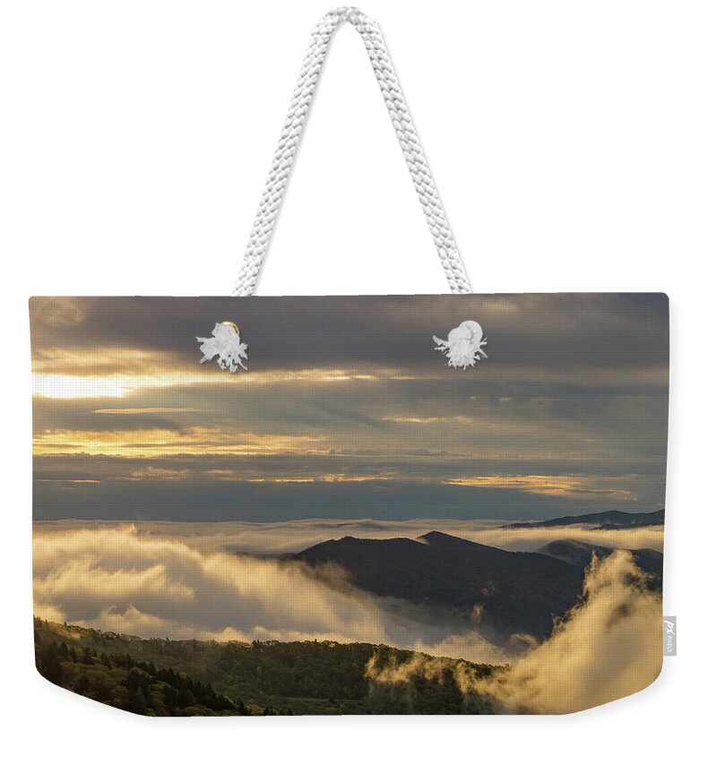 Blueridge Parkway; Landscape; Mountains; Sunrise; Clouds; Shadow; Waterrock Knob; Weekender Tote Bag featuring the photograph Puffy Clouds by Peggy Blackwell