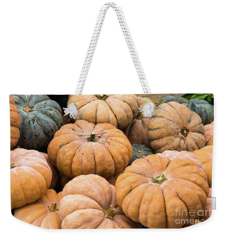 Autumn Weekender Tote Bag featuring the photograph Pumpkins for sale in Korean market by Andrew Michael