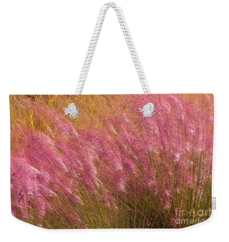 Floral Weekender Tote Bag featuring the photograph Purple Flowers by Susan Cliett