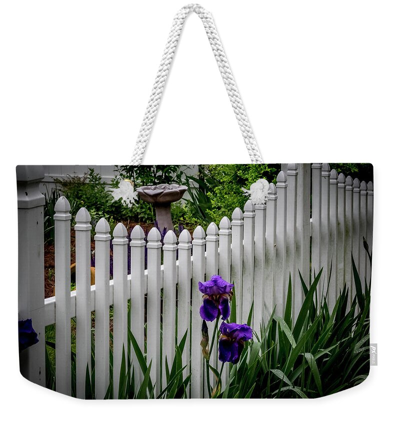 Fence Weekender Tote Bag featuring the digital art Purple Iris and the Fence by Ed Stines