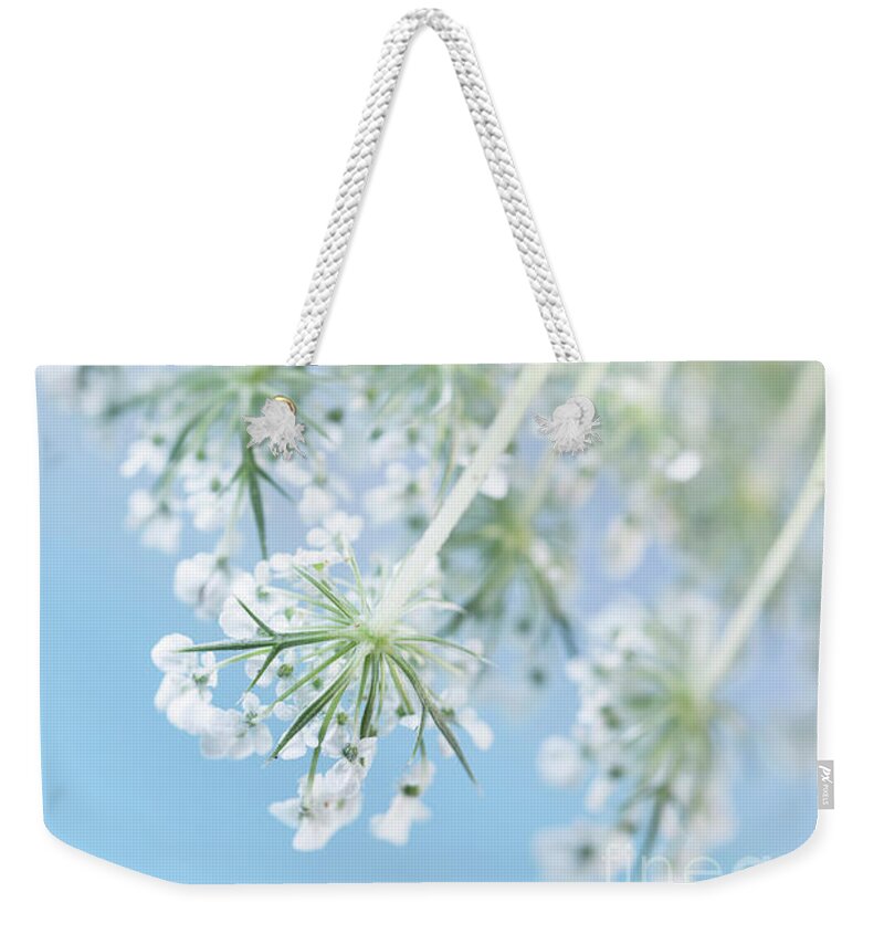 Queen Anne's Lace Weekender Tote Bag featuring the photograph Queen Anne's lace by Masako Metz