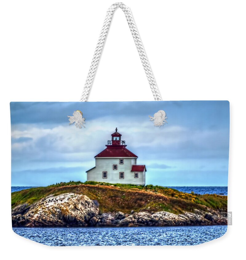 Nova Scotia Weekender Tote Bag featuring the photograph Queensport Lighthouse by Ken Morris