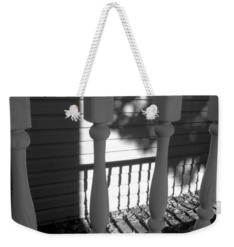 Home Weekender Tote Bag featuring the photograph Railings Silhouette and Shadow by Susan Lafleur