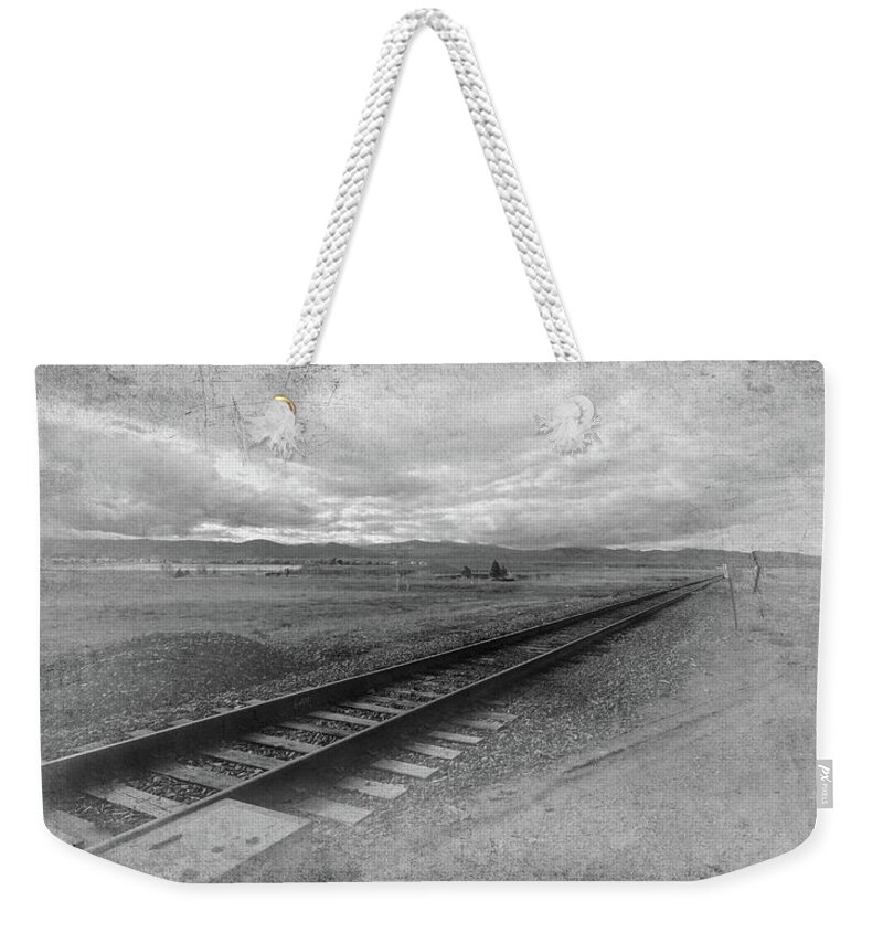 Black And Whites Landscapes Weekender Tote Bag featuring the photograph Railroad Tracks in Black and White by Angie Tirado