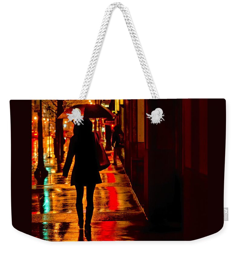 Silhouette Weekender Tote Bag featuring the photograph Rain - City Night - Woman with Umbrella by Nikolyn McDonald