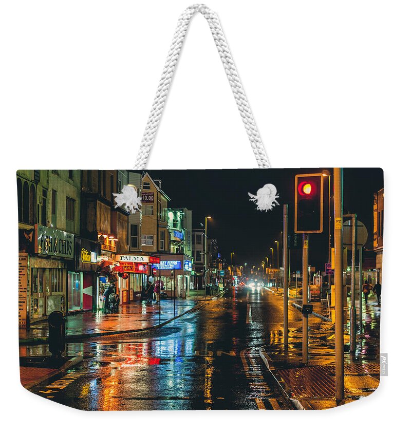 Nikon D90 Weekender Tote Bag featuring the photograph Rain dogs by Nick Barkworth