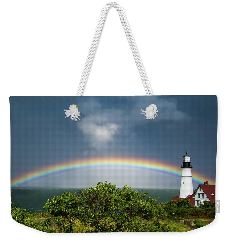 Rainbow Weekender Tote Bag featuring the photograph Rainbow at Portland Headlight by Darryl Hendricks