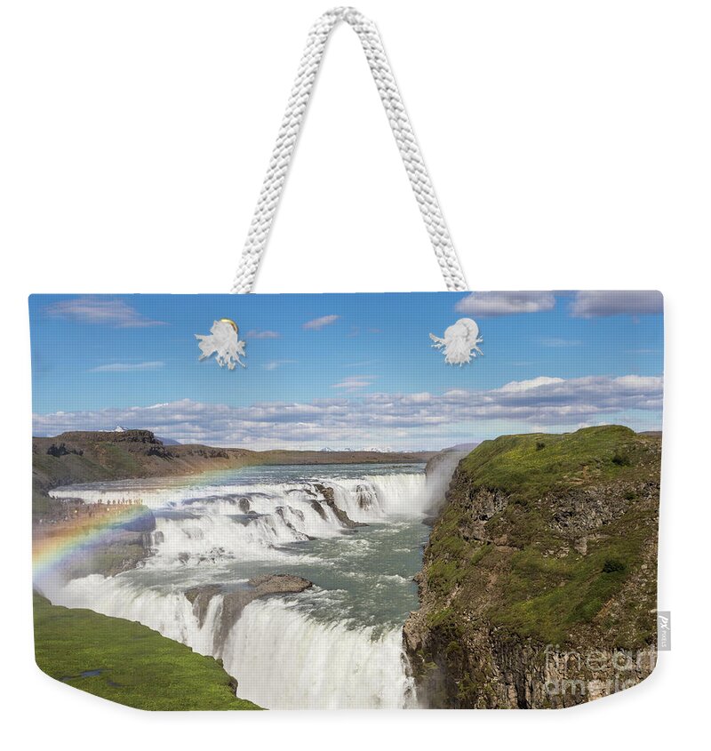 Gullfoss Weekender Tote Bag featuring the photograph Rainbow over the Gullfoss waterfall in Iceland by Didier Marti