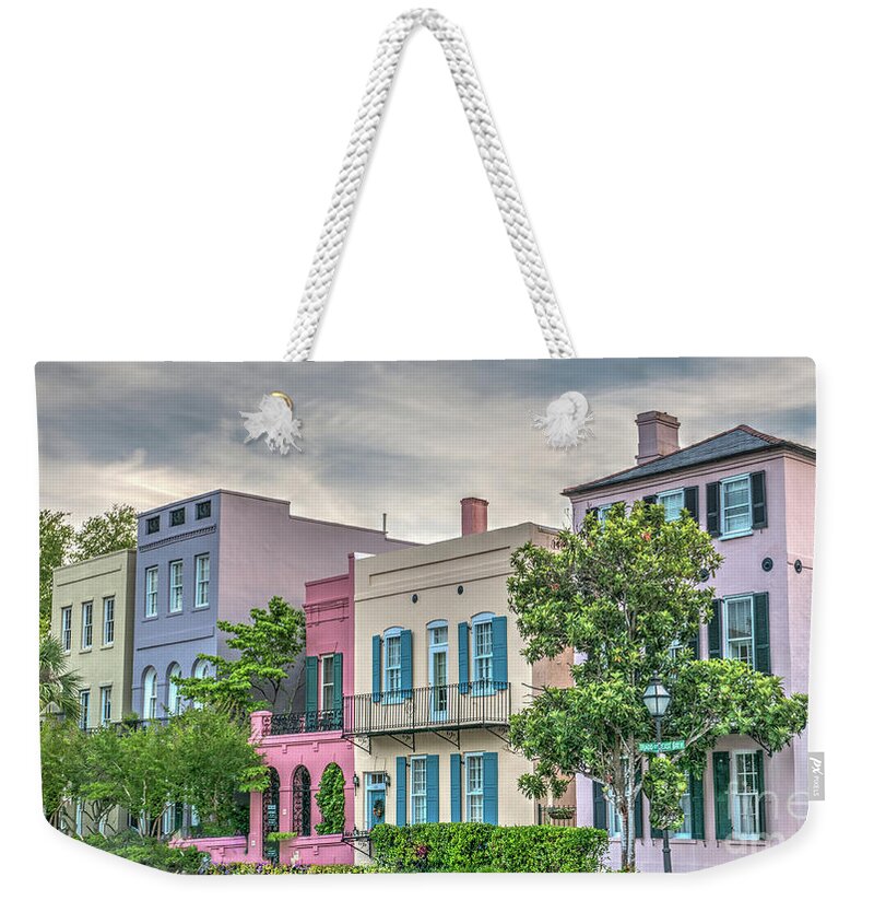 Rainbow Row Weekender Tote Bag featuring the photograph Rainbow Row in Historic Downtown Charleston South Carolina by Dale Powell