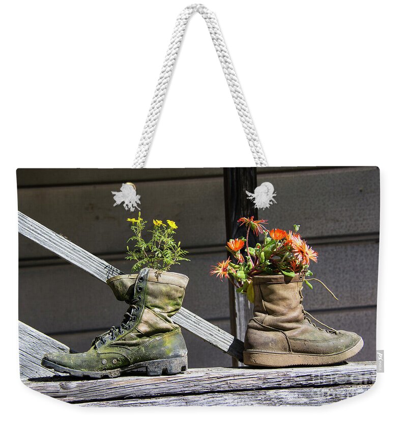 Old Boots Weekender Tote Bag featuring the photograph Rebooted Boots by Paulette Sinclair