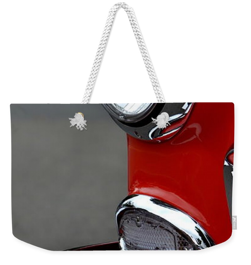 Classic Car Weekender Tote Bag featuring the photograph Red 55 Chevy Headlight by Dean Ferreira