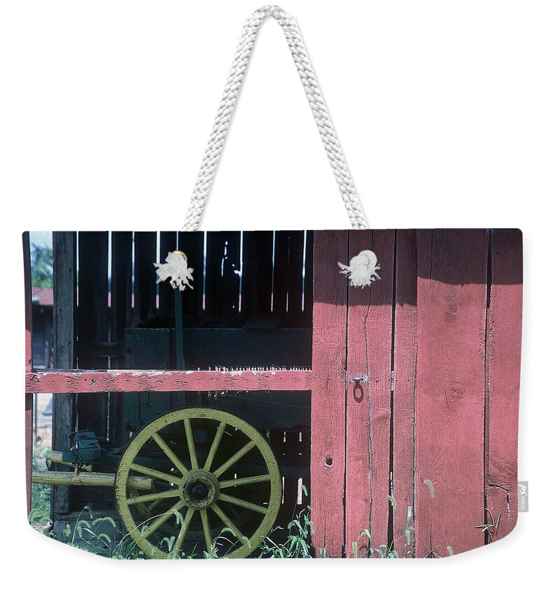 Amish Weekender Tote Bag featuring the pyrography Red Barn and Wagon Wheel by DArcy Evans