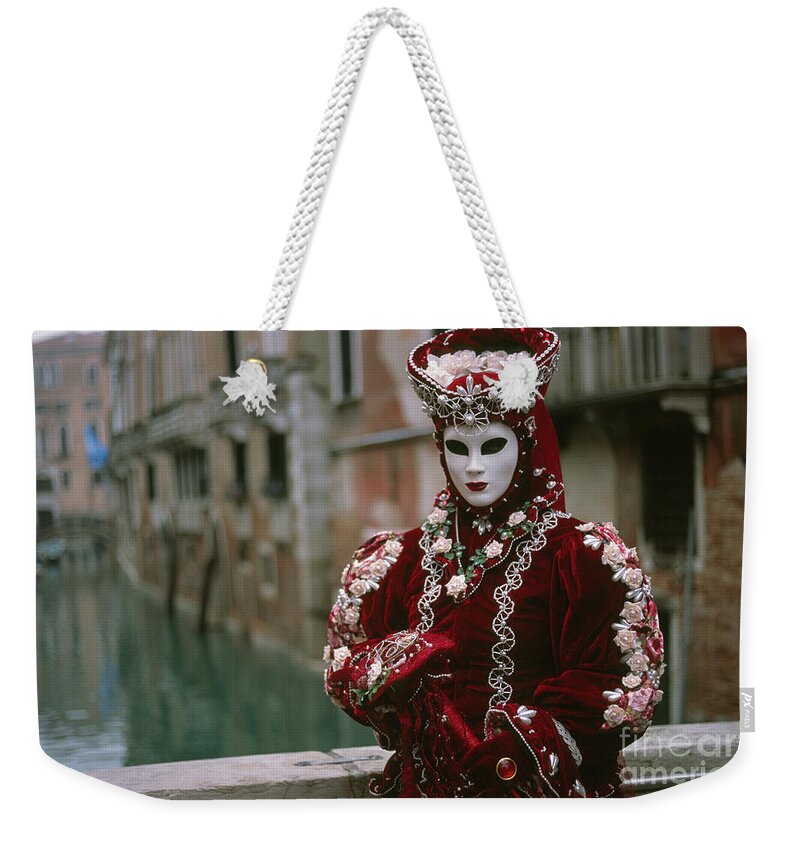 Red Weekender Tote Bag featuring the photograph Red beauty by Riccardo Mottola