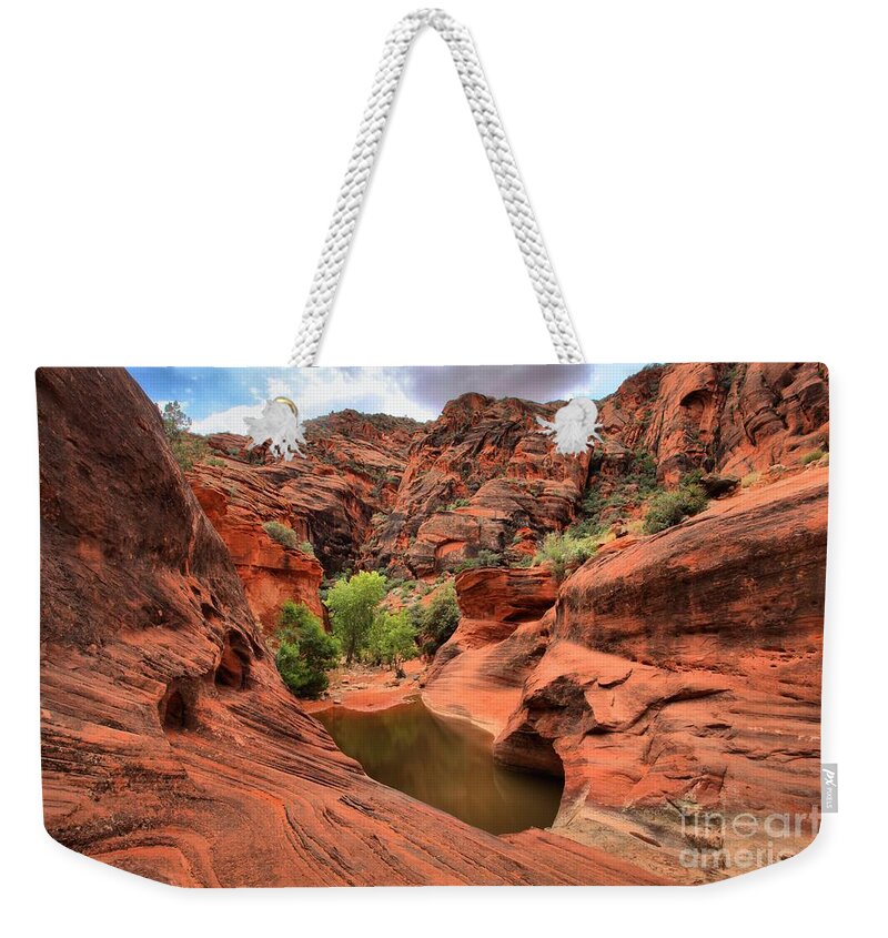 Red Cliffs Weekender Tote Bag featuring the photograph Red Cliffs Waterhole by Adam Jewell