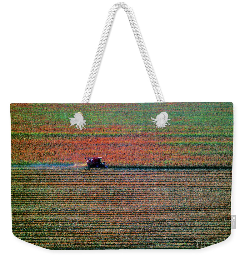 Red Weekender Tote Bag featuring the photograph Red Combine Harvesting Mchenry aerial by Tom Jelen