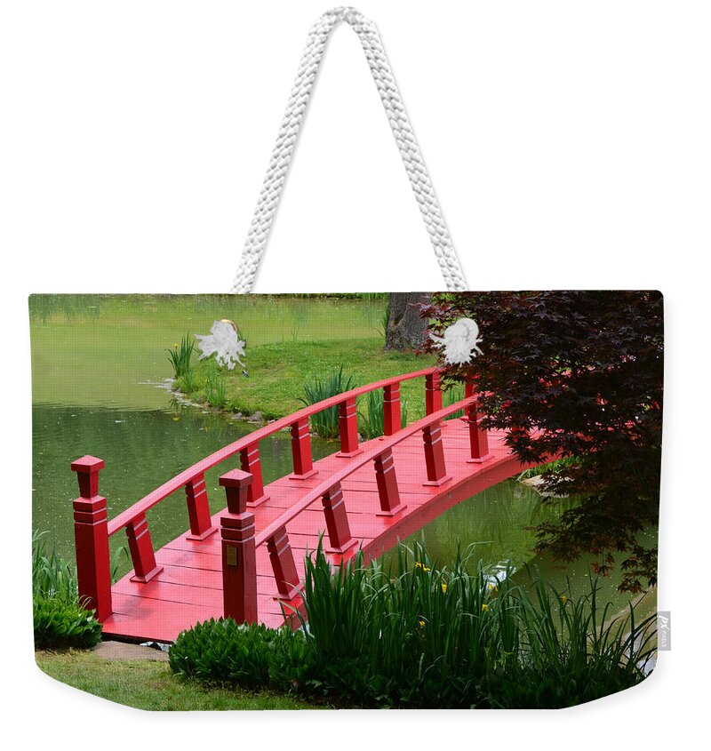 Red Weekender Tote Bag featuring the photograph Red Garden Bridge by Kathleen Stephens