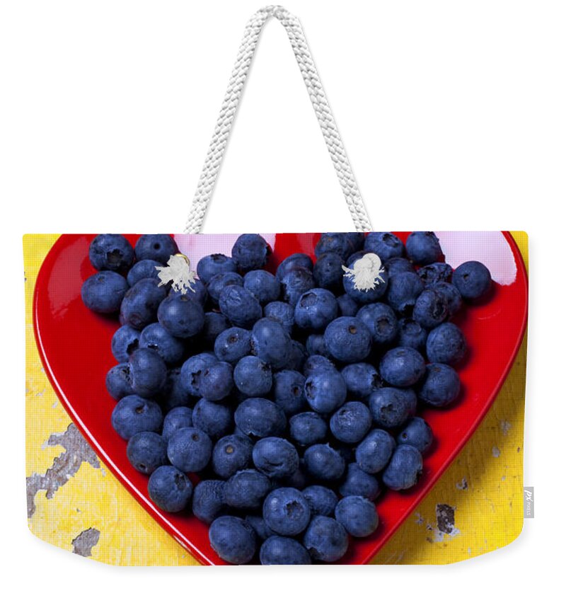 Red Heart Shaped Plate Weekender Tote Bag featuring the photograph Red heart plate with blueberries by Garry Gay
