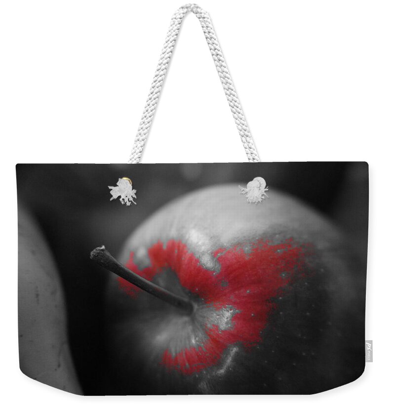 Red Weekender Tote Bag featuring the photograph Red in apple. by Elena Perelman