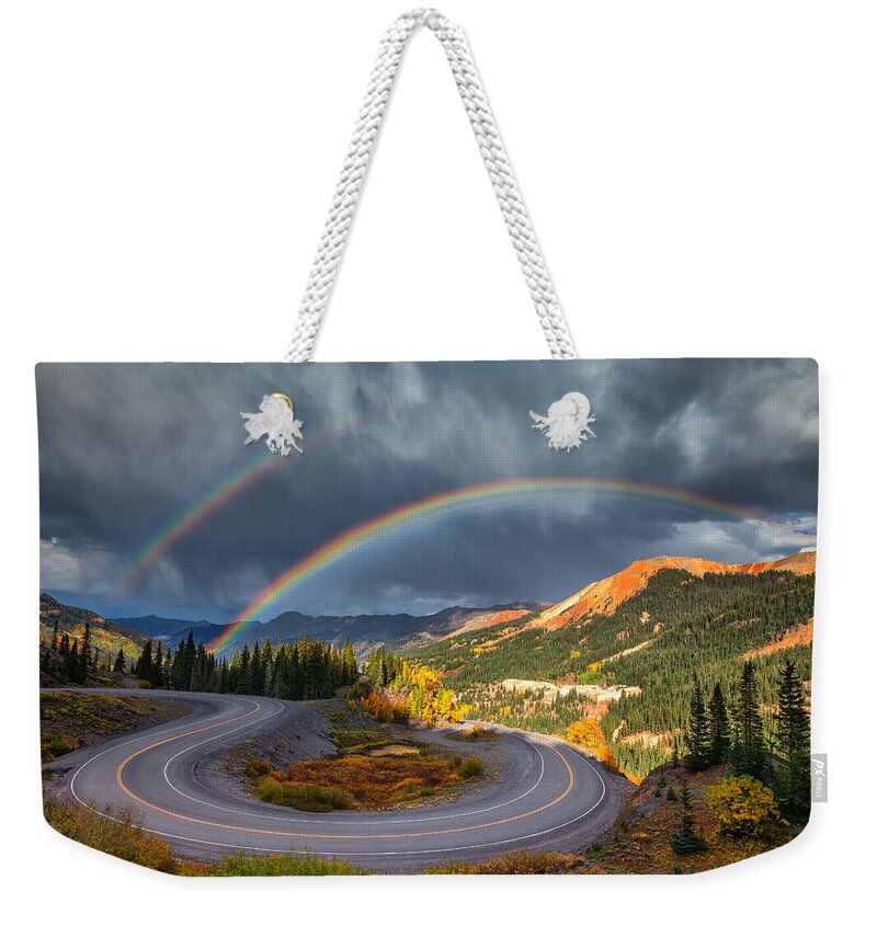 Rainbows Weekender Tote Bag featuring the photograph Red Mountain Rainbow by Darren White