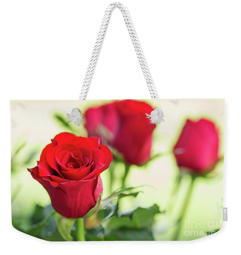 Rose Weekender Tote Bag featuring the photograph Red Roses for Love by Linda Lees
