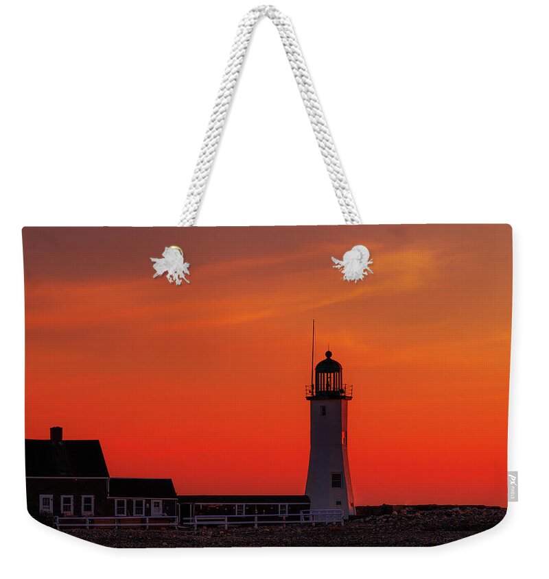 Lighthouse Weekender Tote Bag featuring the photograph Red Sky in the Morning by Rob Davies