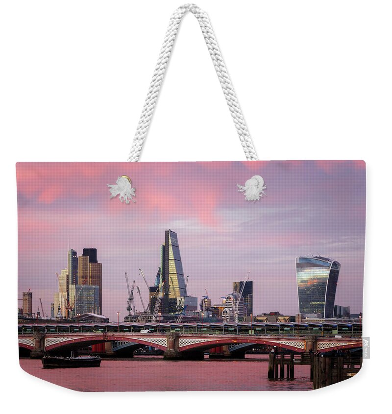 London Weekender Tote Bag featuring the photograph Red Sky Over London by Rick Deacon
