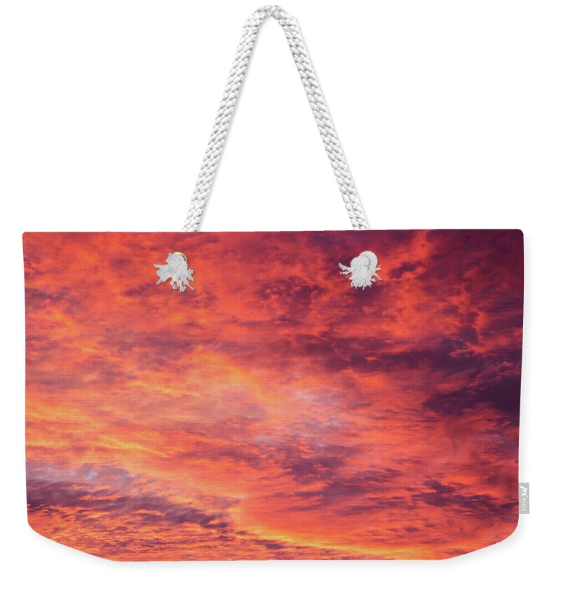 Sky Weekender Tote Bag featuring the photograph Red sunset sky by GoodMood Art