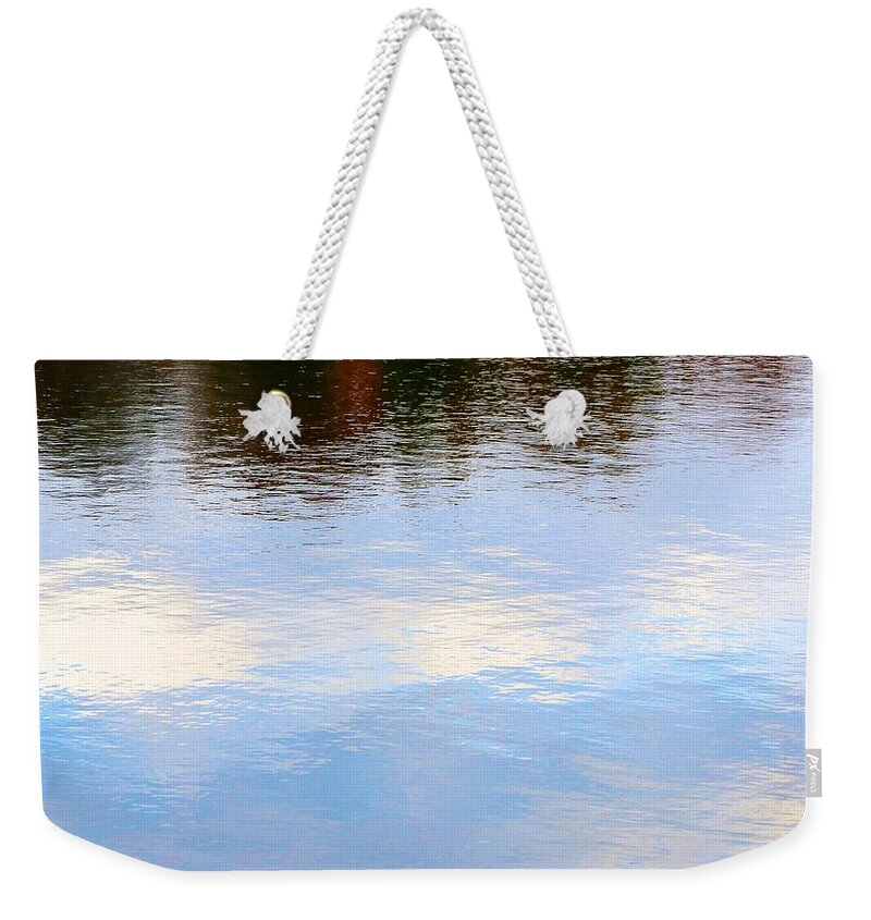  Weekender Tote Bag featuring the photograph Reflected Clouds by Polly Castor