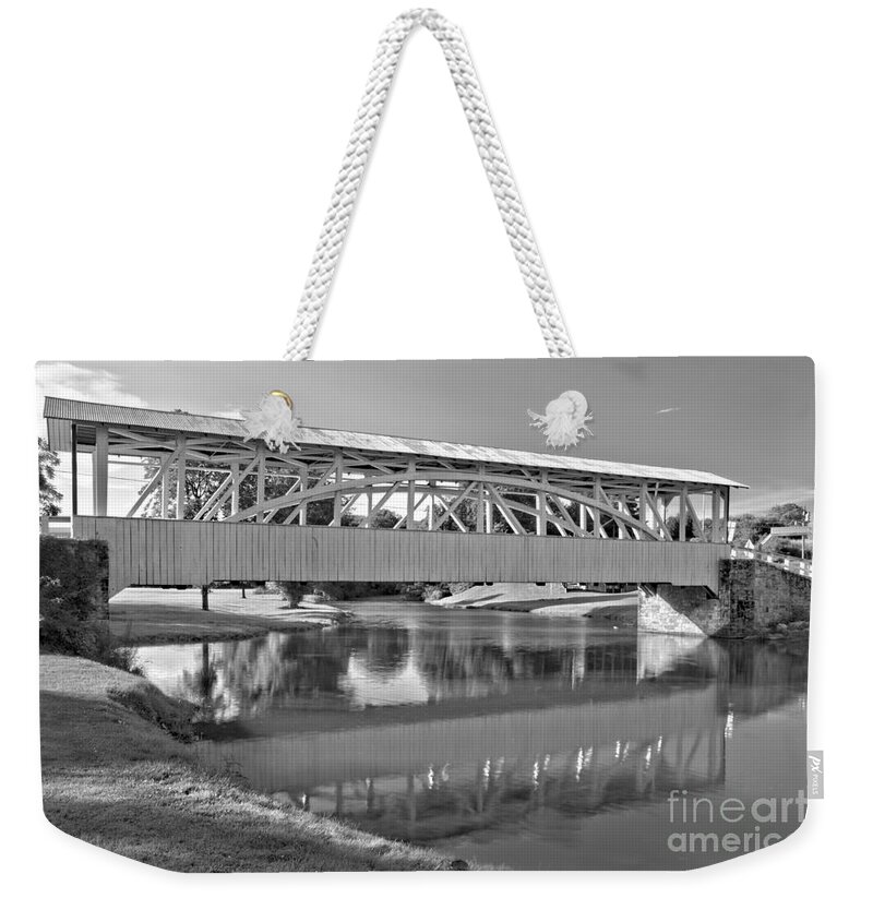 Halls Mill Covered Bridge Weekender Tote Bag featuring the photograph Reflections Of The Halls Mill Covered Bridge Black And White by Adam Jewell