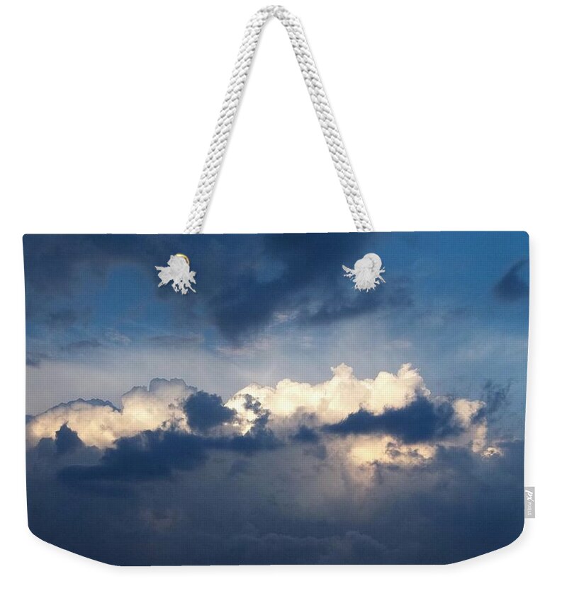 Clouds Weekender Tote Bag featuring the photograph Revelation One-Seven by Glenn McCarthy Art and Photography