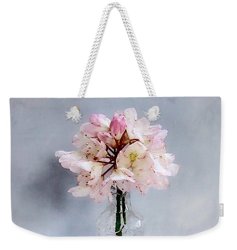 Flower Weekender Tote Bag featuring the photograph Rhododendron Bloom in a Glass Bottle by Louise Kumpf