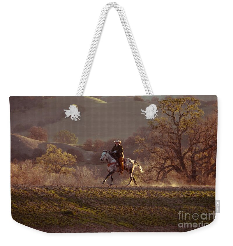 Cowboy Weekender Tote Bag featuring the photograph Horseback on Top of the Hill by Ana V Ramirez