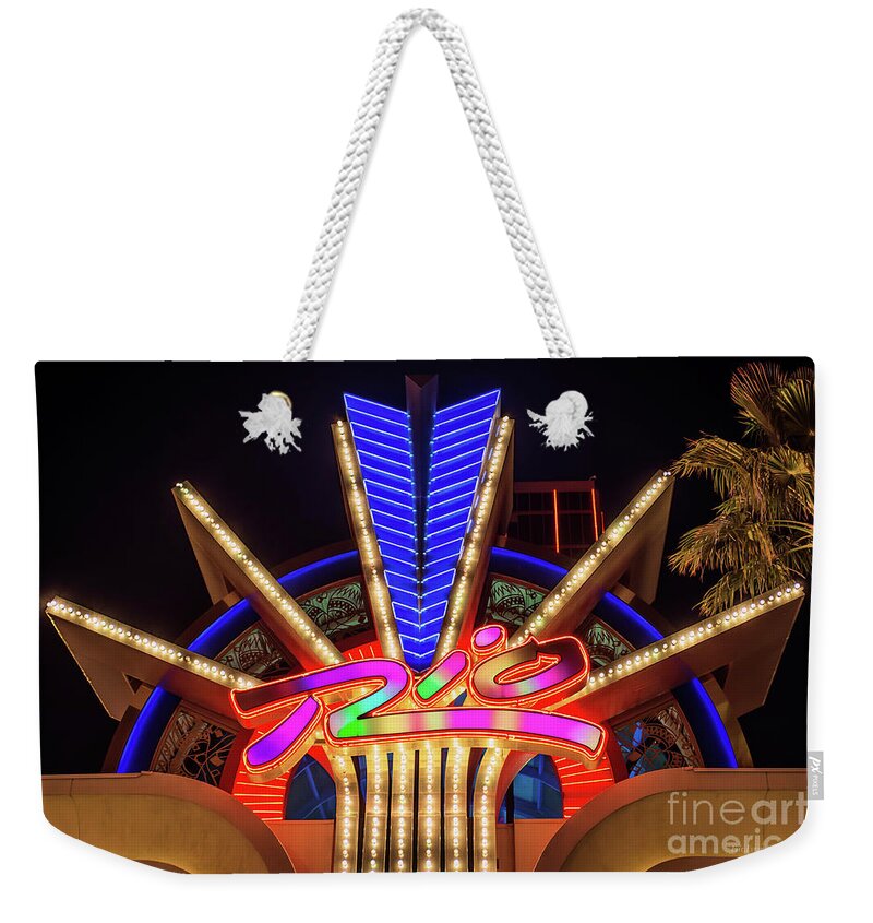 The Rio Weekender Tote Bag featuring the photograph Rio Casino Small Neon Sign by Aloha Art
